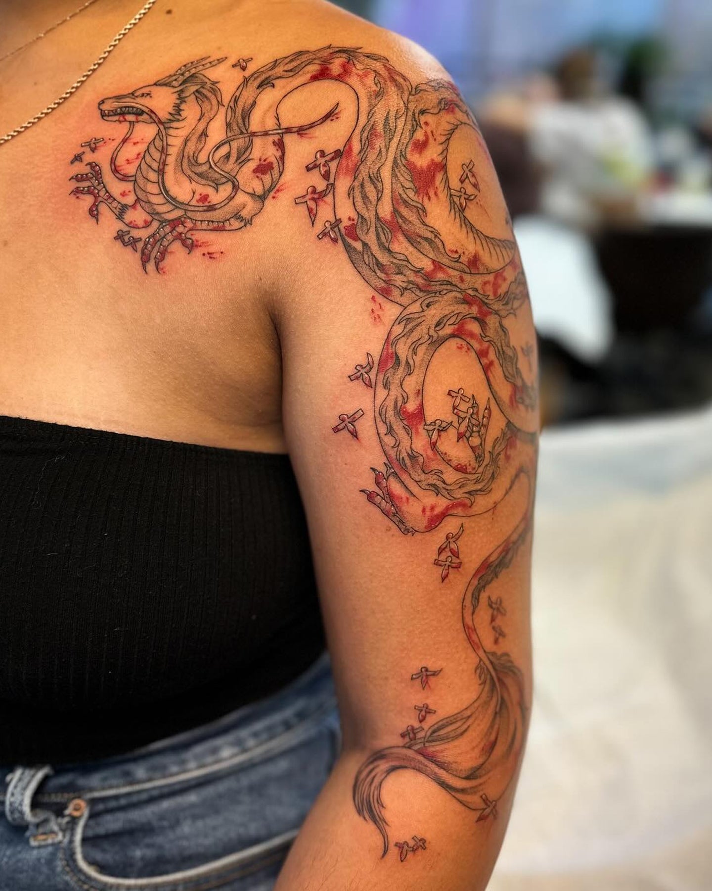 Hxllcat tattoo work at Beach Park Tattoo