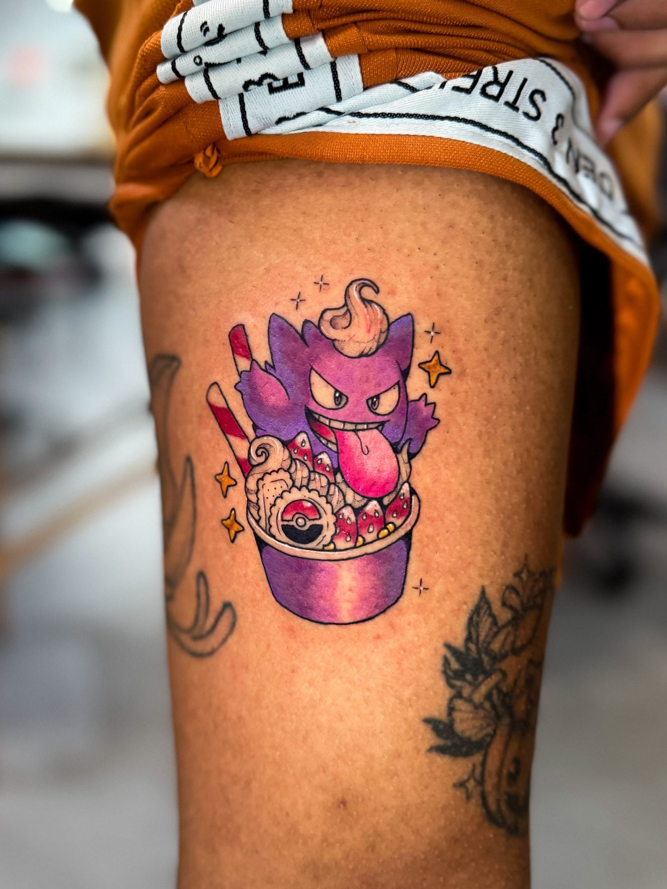 Hxllcat tattoo work at Beach Park Tattoo