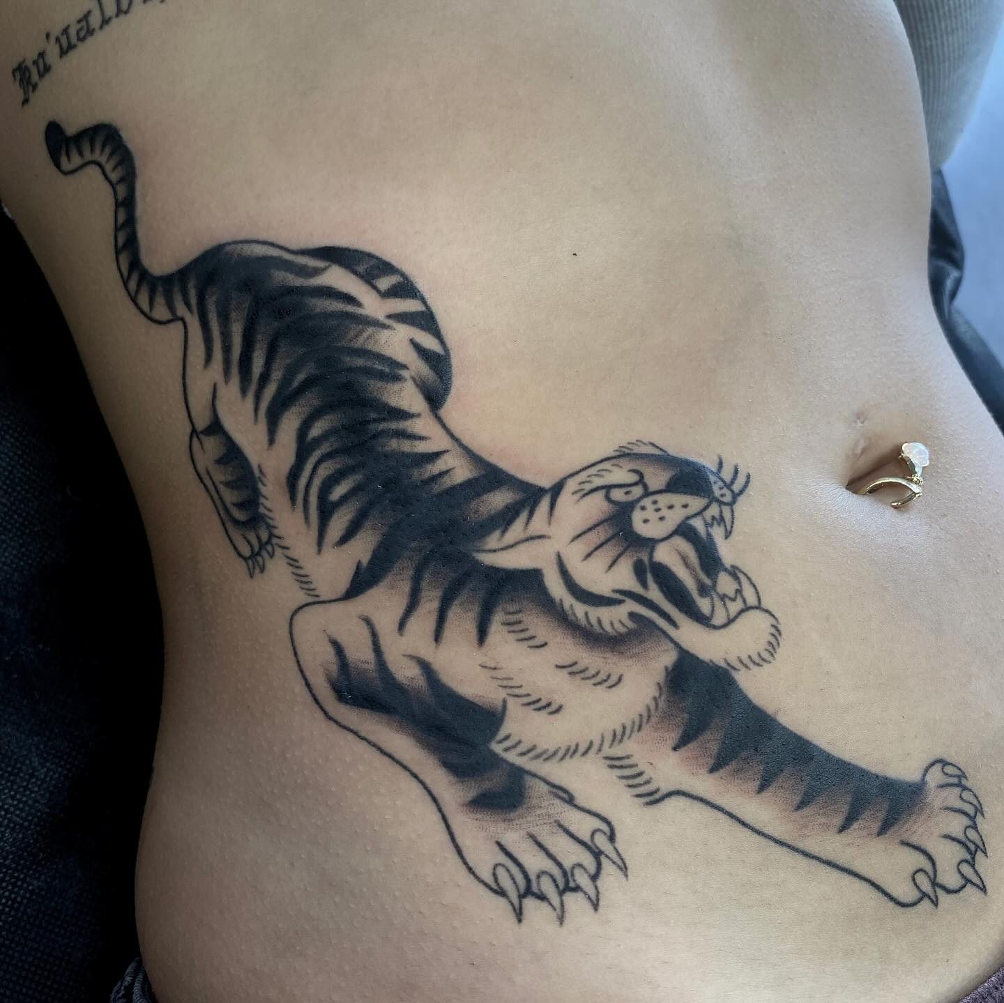 Lily tattoo work at Beach Park Tattoo