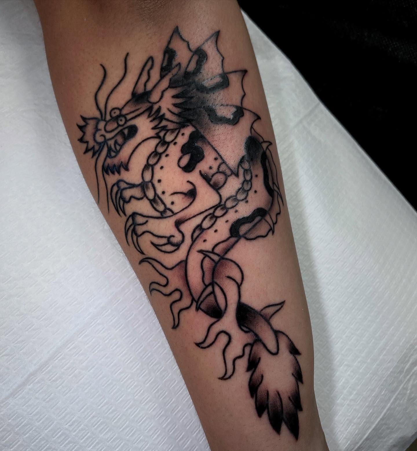 Lily tattoo work at Beach Park Tattoo